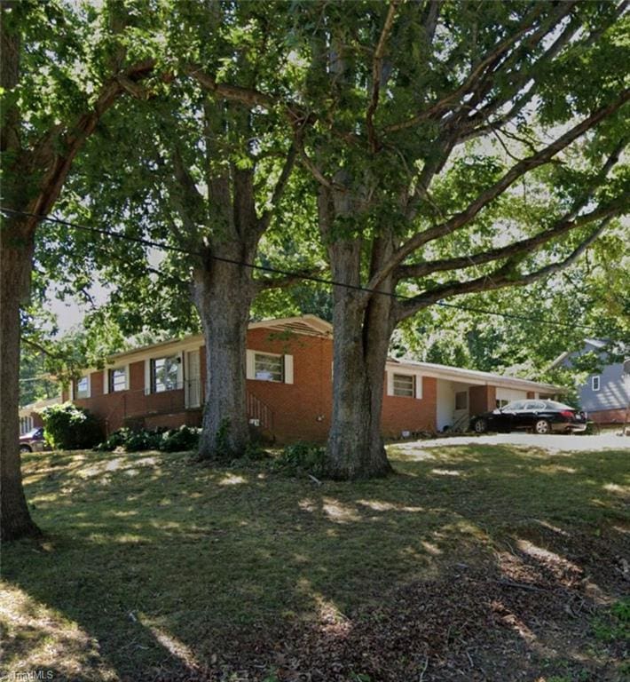 view of home's exterior featuring a lawn