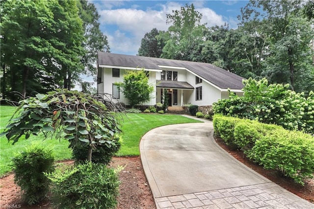 view of front of home with a front yard