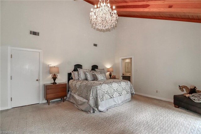 bedroom with beam ceiling, high vaulted ceiling, and an inviting chandelier