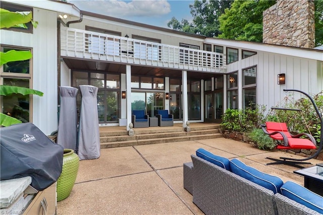 view of patio / terrace featuring a grill and an outdoor living space