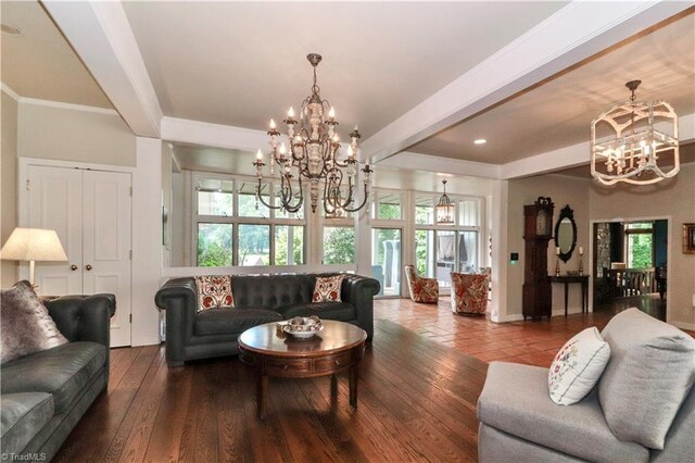 living room featuring hardwood / wood-style floors, beamed ceiling, and a chandelier