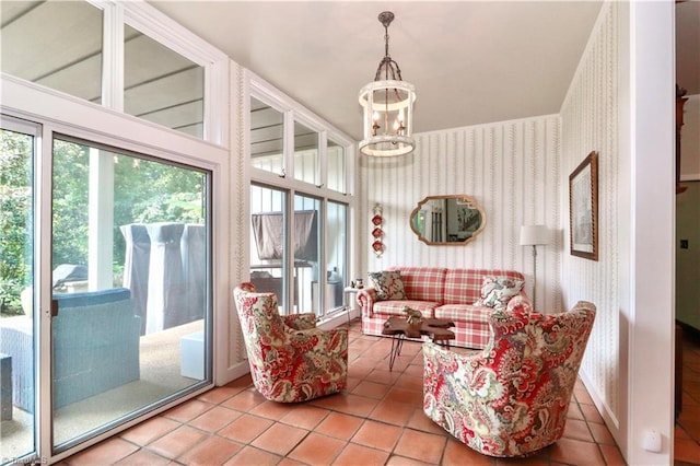 sunroom with an inviting chandelier