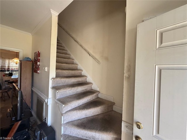 stairs with crown molding