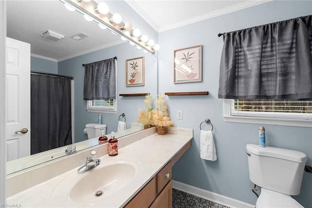 bathroom featuring vanity, toilet, and ornamental molding