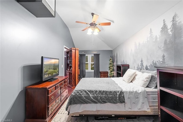 bedroom featuring ceiling fan and lofted ceiling