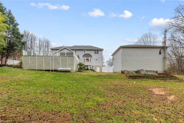 view of yard with a wooden deck