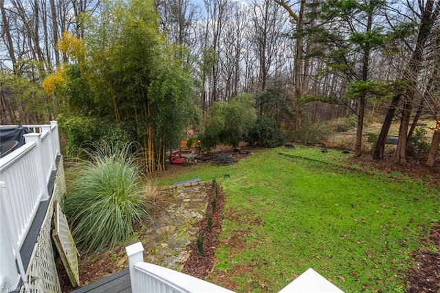 view of yard with a wooden deck