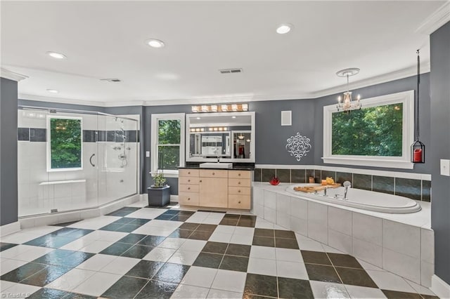 bathroom featuring shower with separate bathtub, vanity, ornamental molding, and a notable chandelier