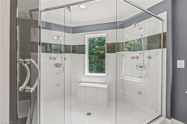 bathroom featuring ornamental molding and walk in shower