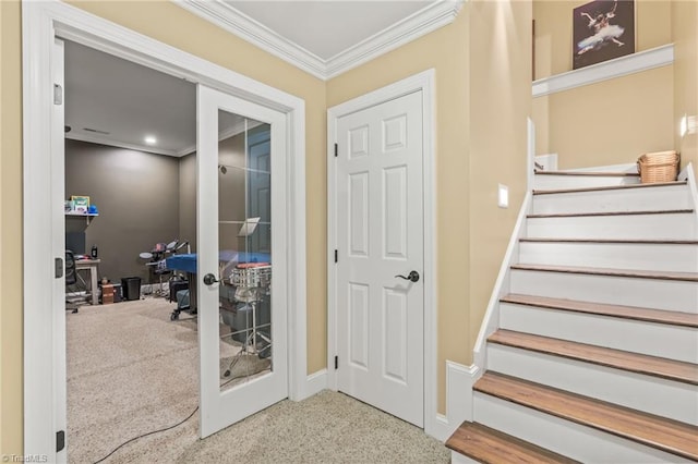 doorway to outside featuring carpet floors and ornamental molding