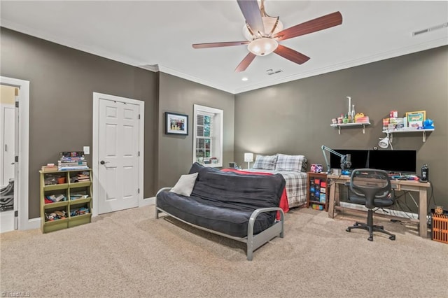 carpeted bedroom with ceiling fan and ornamental molding