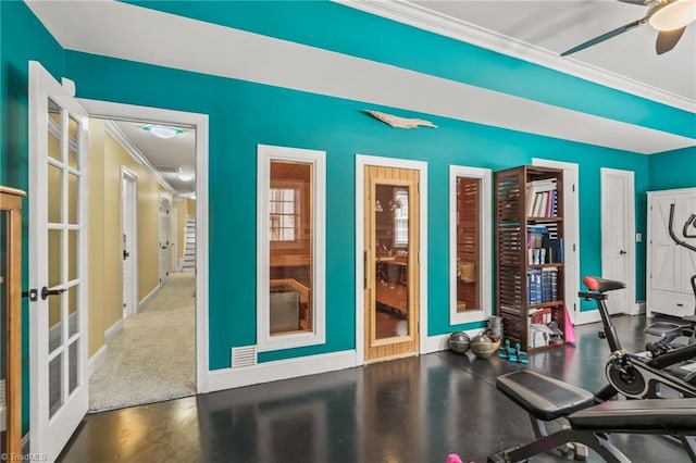 exercise room featuring french doors, ceiling fan, and ornamental molding