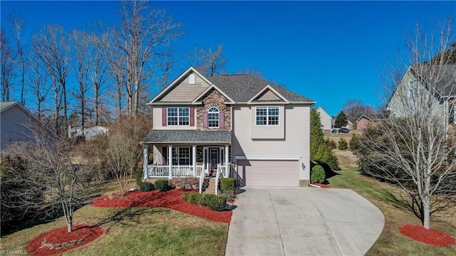 view of front of home with a porch, a garage, and a front lawn