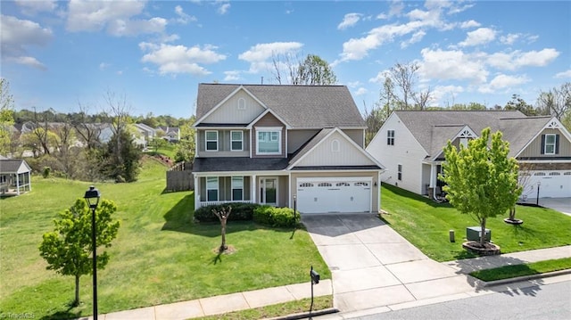 traditional-style house with a shingled roof, a garage, concrete driveway, a front lawn, and a residential view
