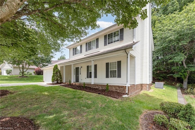 5207 Highland Oak Ct, Greensboro, NC 27410 - view of front of home with a garage, covered porch, a front lawn, and a chimney