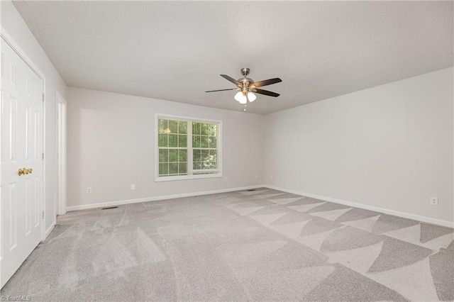 5207 Highland Oak Ct, Greensboro, NC 27410 - unfurnished bedroom with light carpet and ceiling fan