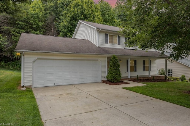 5207 Highland Oak Ct, Greensboro, NC 27410 - view of front facade featuring concrete driveway, a front yard, an attached garage, and a porch