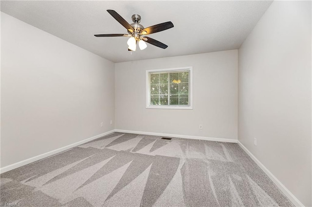 5207 Highland Oak Ct, Greensboro, NC 27410 - carpeted spare room with a ceiling fan and baseboards