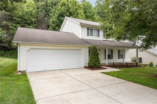 5207 Highland Oak Ct, Greensboro, NC 27410 - traditional-style house featuring concrete driveway, an attached garage, a front yard, and covered porch