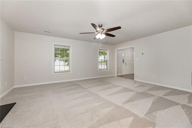 5207 Highland Oak Ct, Greensboro, NC 27410 - unfurnished room with light carpet and a ceiling fan