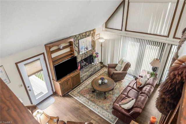 1920 Chateau Rdg, Winston-Salem, NC 27103 - living area featuring wood finished floors, a fireplace, and lofted ceiling