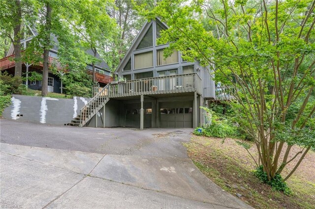 1920 Chateau Rdg, Winston-Salem, NC 27103 - view of front of property featuring driveway, a garage, and stairway