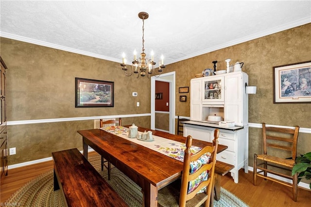 4717 Deaton Rd, Trinity, NC 27370 - dining area featuring wood finished floors, a chandelier, and crown molding