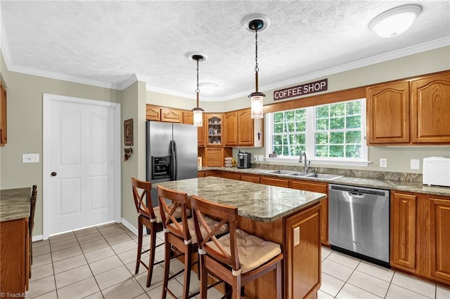 4717 Deaton Rd, Trinity, NC 27370 - kitchen with stainless steel appliances, brown cabinetry, light tile patterned flooring, ornamental molding, and a textured ceiling