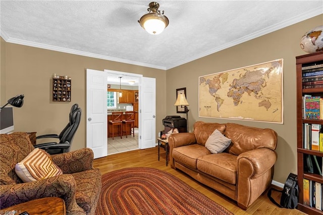 4717 Deaton Rd, Trinity, NC 27370 - living area featuring light wood finished floors, ornamental molding, a desk, and a textured ceiling