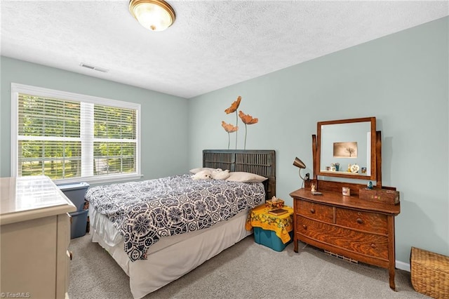 4717 Deaton Rd, Trinity, NC 27370 - carpeted bedroom with a textured ceiling