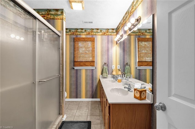 4717 Deaton Rd, Trinity, NC 27370 - full bath with double vanity, a stall shower, and tile patterned flooring