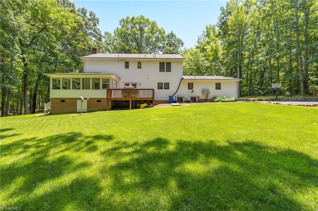 4717 Deaton Rd, Trinity, NC 27370 - back of property with a chimney, a yard, a sunroom, and a deck
