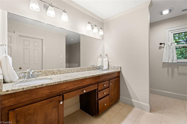 bathroom with tile patterned flooring, baseboards, double vanity, and ornamental molding