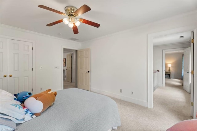 bedroom with crown molding, light carpet, baseboards, and a ceiling fan