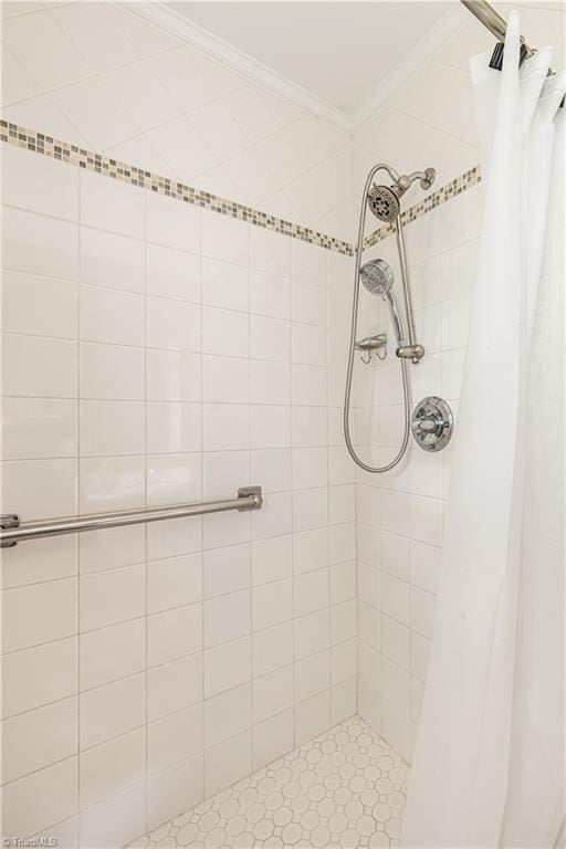 2014 Medhurst Dr, Greensboro, NC 27410 - bathroom featuring crown molding and tiled shower
