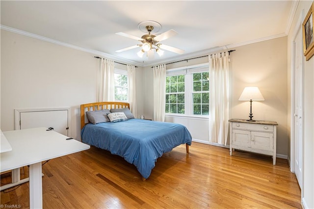 2014 Medhurst Dr, Greensboro, NC 27410 - bedroom featuring ornamental molding, light wood finished floors, baseboards, and a ceiling fan