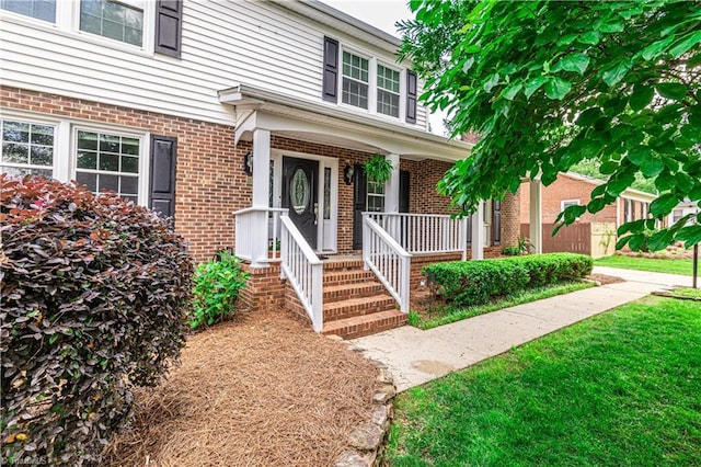 2014 Medhurst Dr, Greensboro, NC 27410 - view of front of property featuring brick siding and a porch