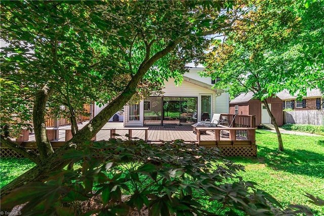 2014 Medhurst Dr, Greensboro, NC 27410 - rear view of house with a wooden deck