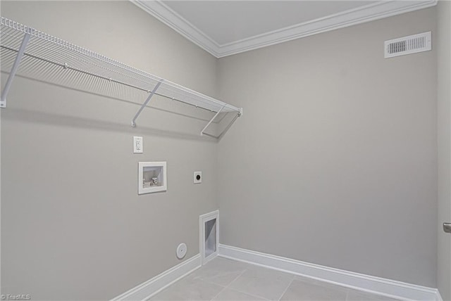 laundry room featuring light tile patterned flooring, gas dryer hookup, hookup for a washing machine, crown molding, and electric dryer hookup