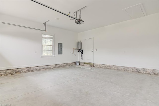 garage featuring a garage door opener, water heater, and electric panel