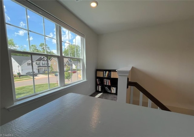 stairway featuring recessed lighting