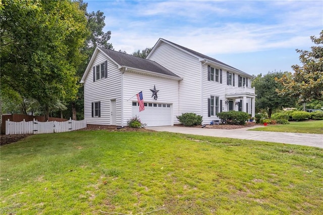 view of front of home with a garage, concrete driveway, fence, and a front lawn