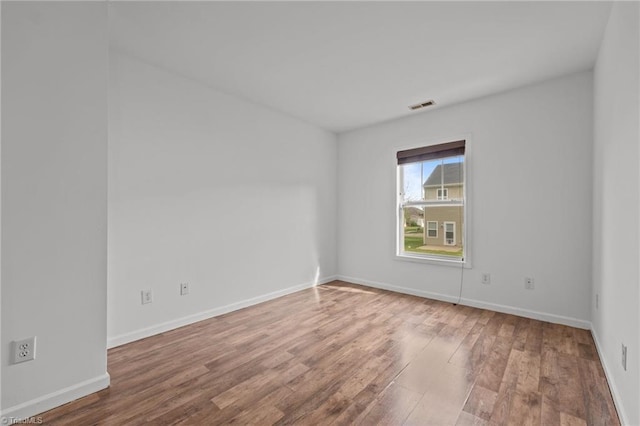 1310 Silver Dr, Mebane, NC 27302 - empty room with wood finished floors and baseboards