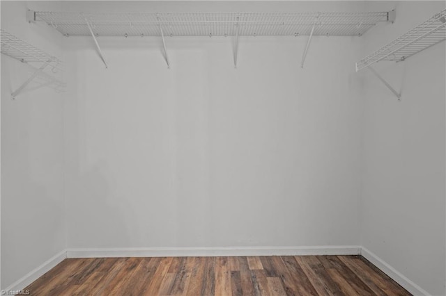 1310 Silver Dr, Mebane, NC 27302 - spacious closet featuring dark wood-style flooring
