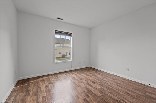 1310 Silver Dr, Mebane, NC 27302 - empty room featuring wood finished floors and baseboards