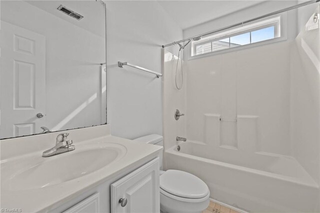 1310 Silver Dr, Mebane, NC 27302 - bathroom with toilet, shower / bathtub combination, and vanity
