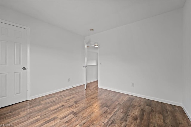 1310 Silver Dr, Mebane, NC 27302 - empty room with wood finished floors and baseboards