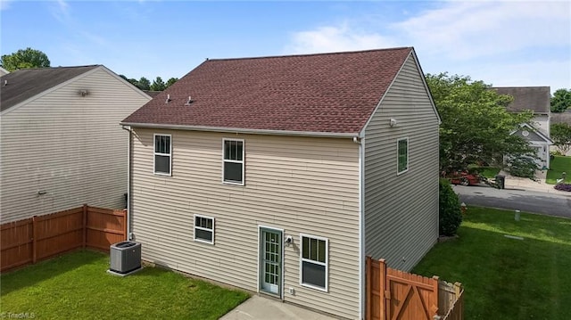 1310 Silver Dr, Mebane, NC 27302 - rear view of property featuring central AC unit and roof with shingles