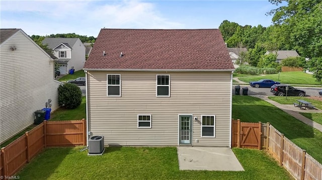 1310 Silver Dr, Mebane, NC 27302 - back of house featuring a gate, a patio, and cooling unit
