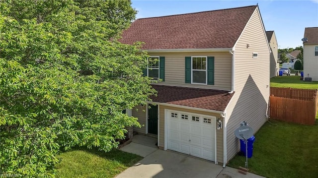 1310 Silver Dr, Mebane, NC 27302 - view of front of property featuring an attached garage, a shingled roof, and driveway